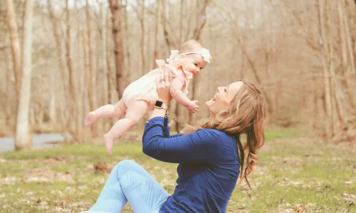 women carrying a baby